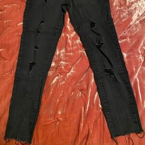 black distressed jeans